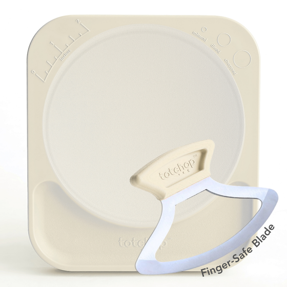 Totchop Kids set showing finger-safe knife, board, and silicone cutting insert.