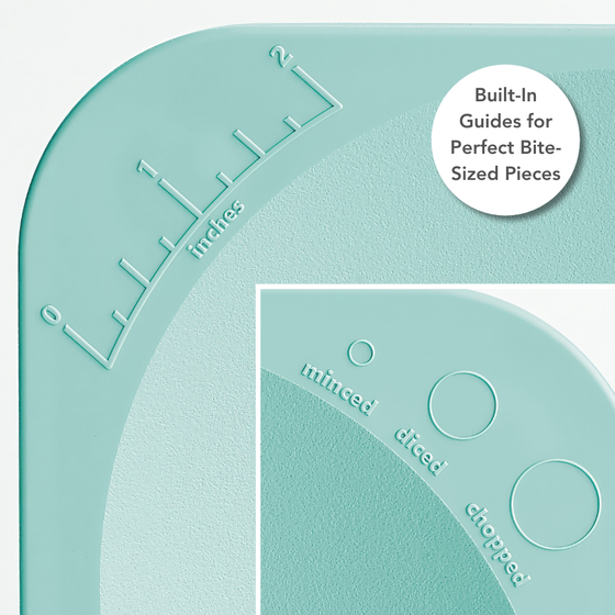 Zoomed in visual of tactile measuring aides molded into the cutting board surface.  